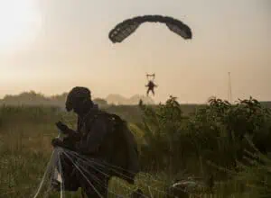 Airborne parachute troops landing