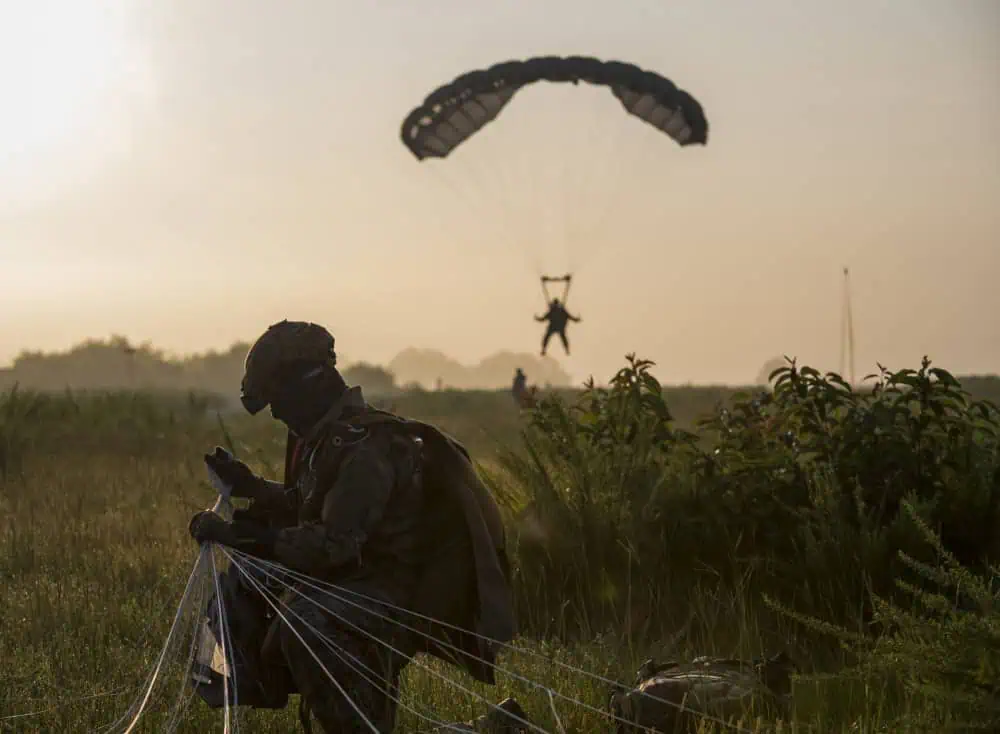Airborne parachute troops landing